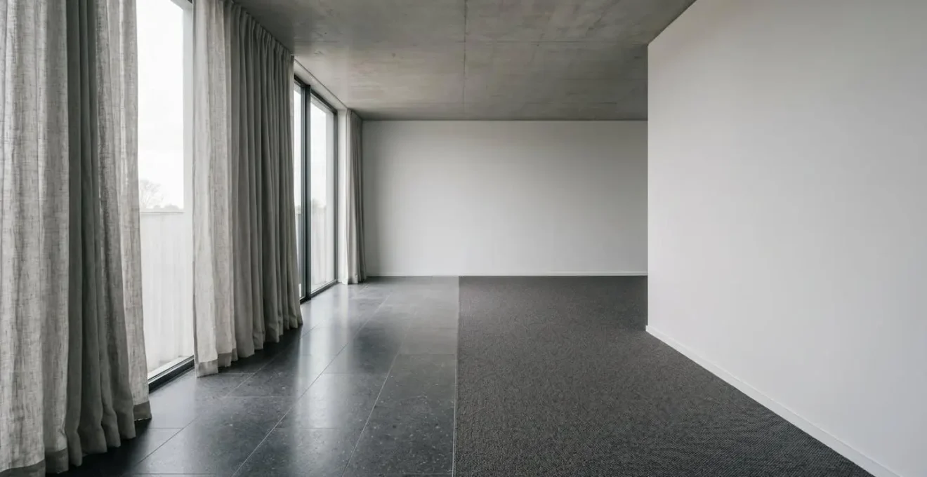 Minimalist interior space showing architectural elements that create natural acoustic reflections and depth perception