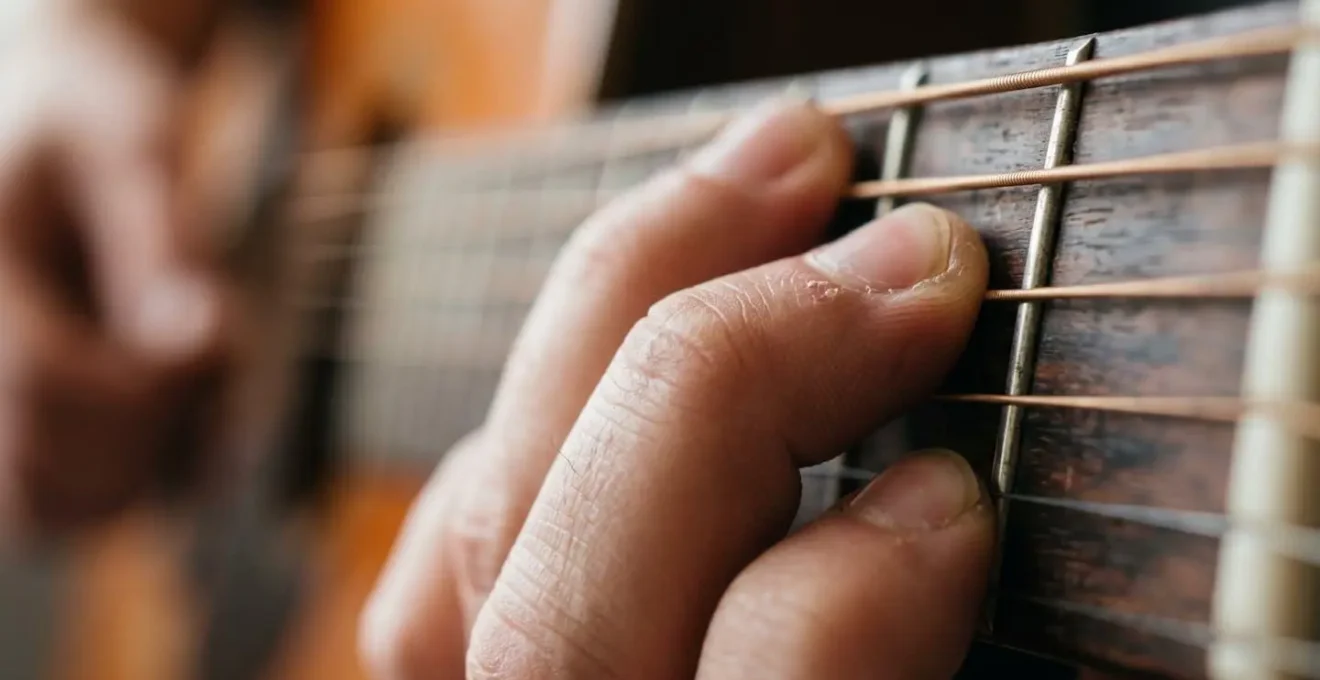 Close intimate detail showing genuine moment of musical discovery and emotional connection